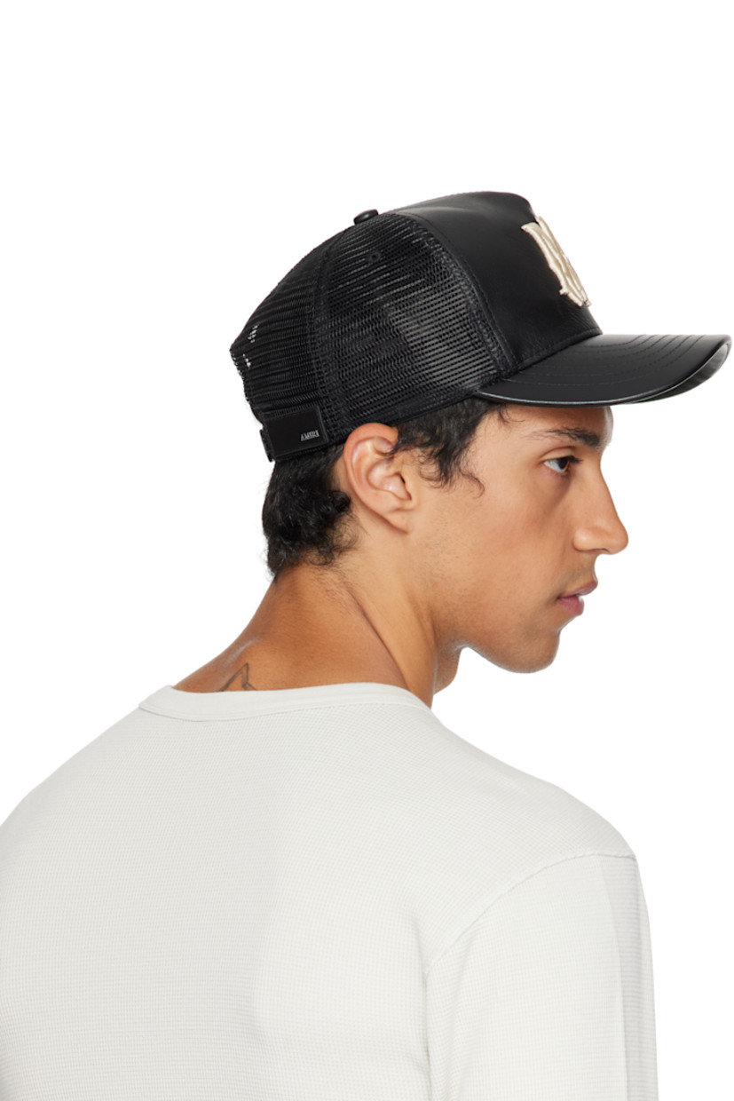 Mesh and buffed leather cap.

· Logo embroidered at face
· Curved brim
· Logo plaque at snapback fastening
· Twill lining

Supplier color: Black