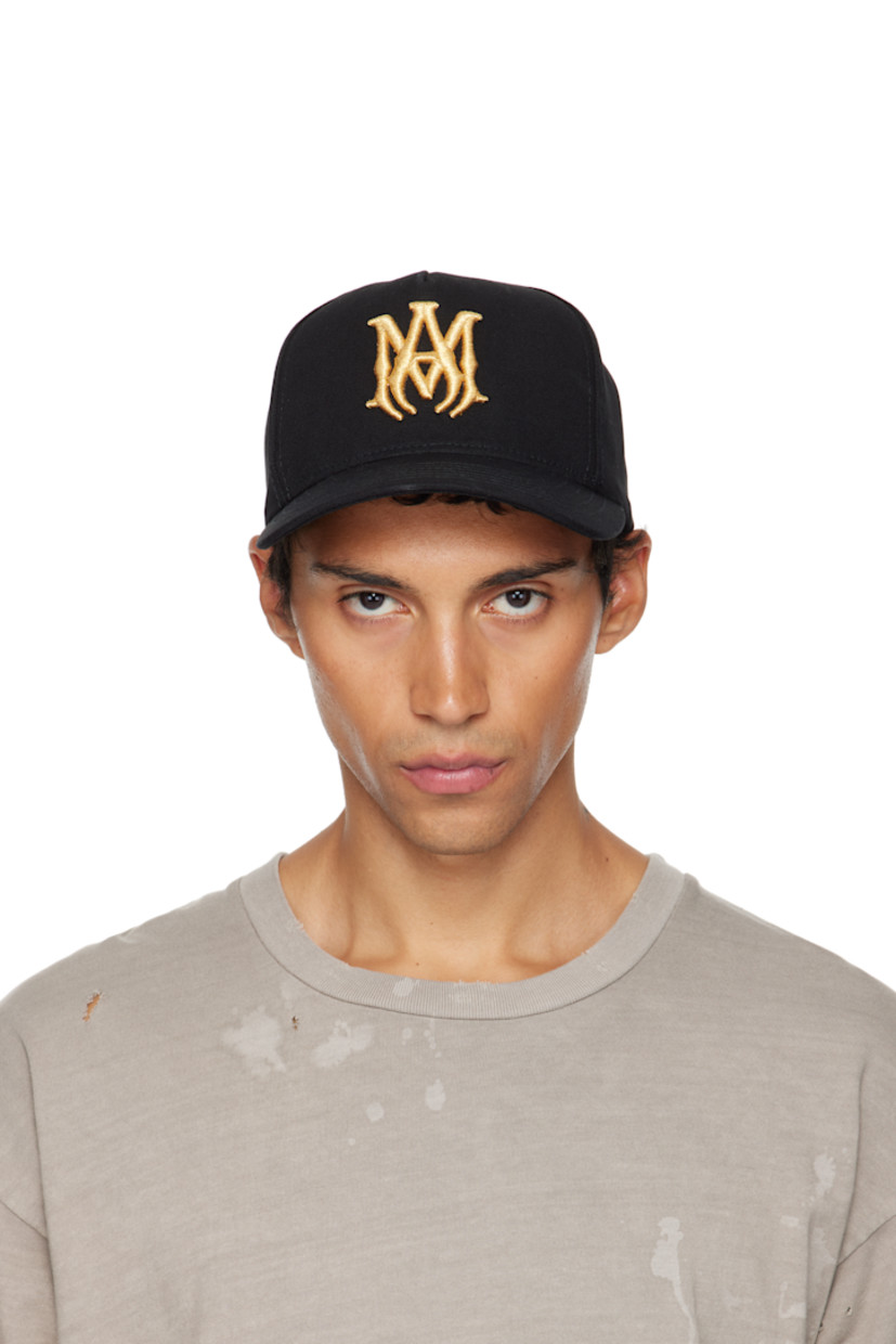 Cotton canvas cap.

· Embroidered eyelets at crown
· Logo embroidered at face
· Curved brim
· Logo patch at back face
· Snapback fastening
· Twill lining

Supplier color: Black