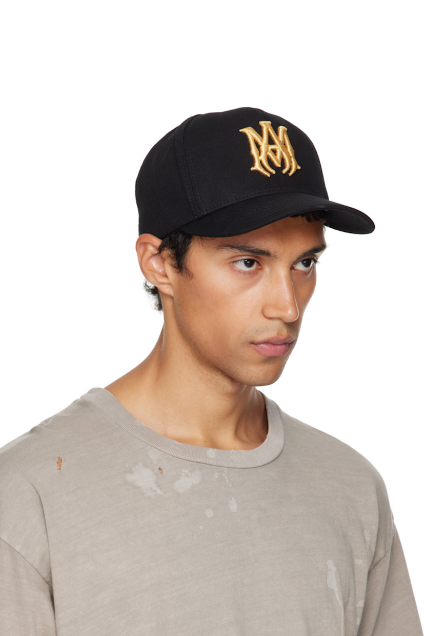 Cotton canvas cap.

· Embroidered eyelets at crown
· Logo embroidered at face
· Curved brim
· Logo patch at back face
· Snapback fastening
· Twill lining

Supplier color: Black