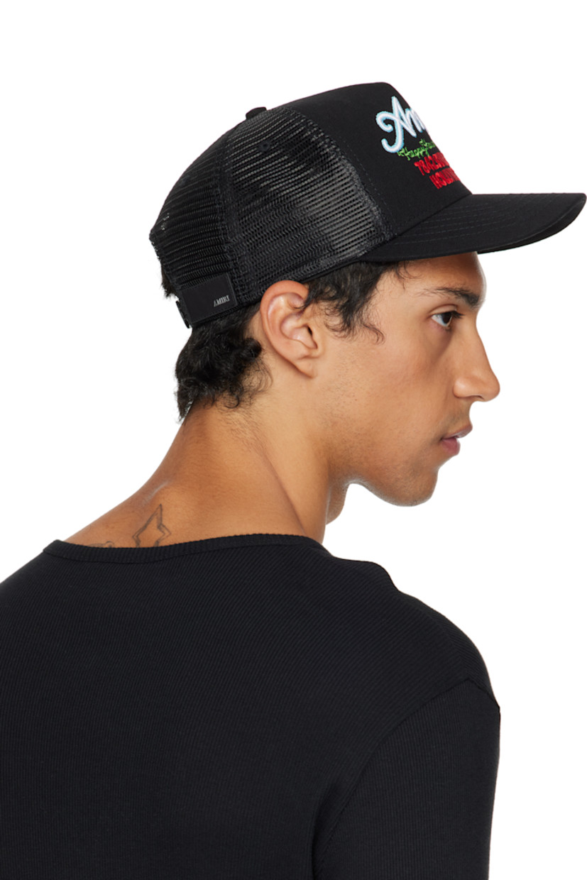 Mesh and cotton canvas cap.

· Logo and text embroidered at face
· Curved brim
· Logo patch at back face
· Logo plaque at snapback fastening
· Twill lining

Supplier color: Black