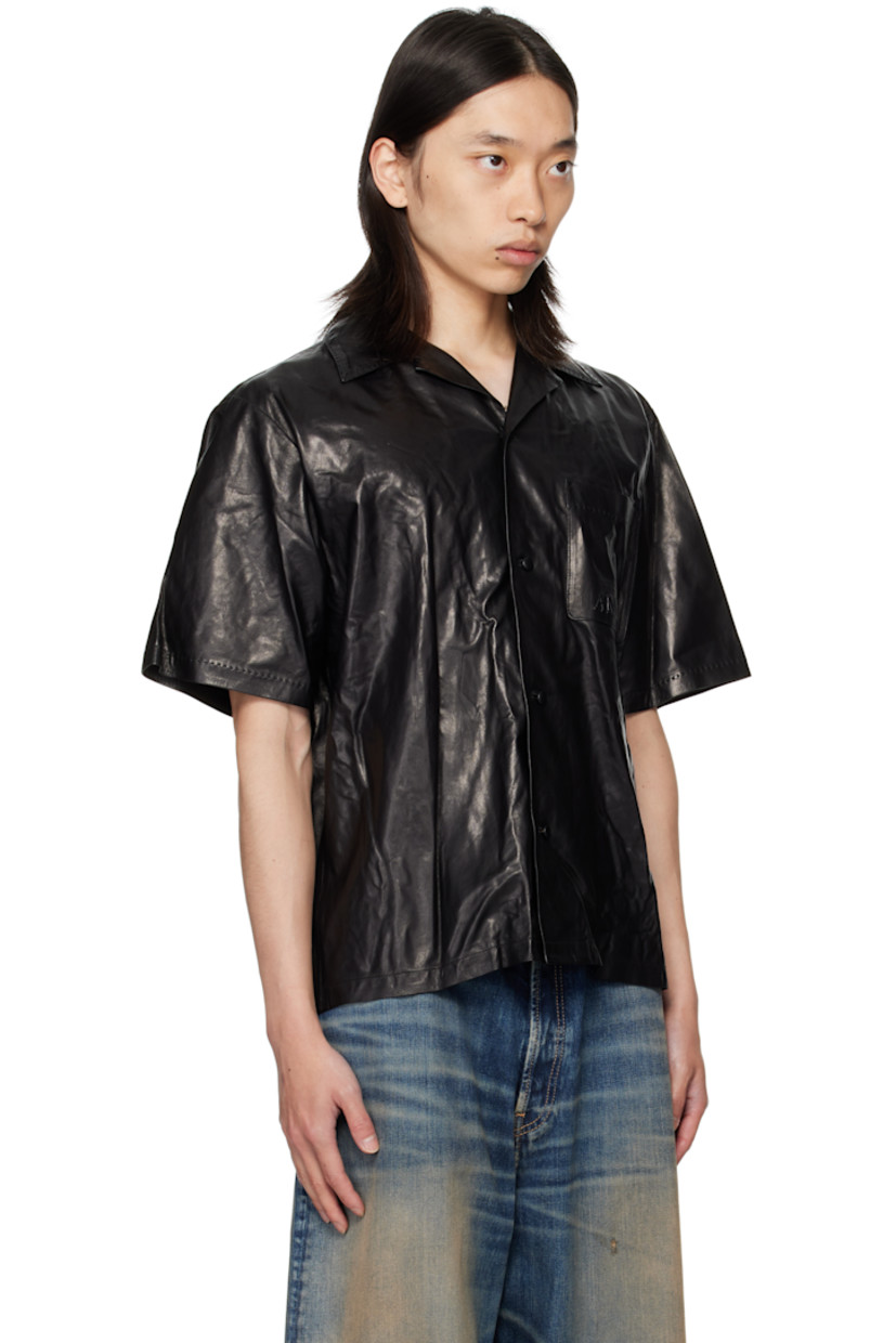 Grained lambskin shirt.

· Open spread collar
· Button closure
· Patch pocket at chest
· Logo embossed at chest and back
· Suede interior

Supplier color: Black