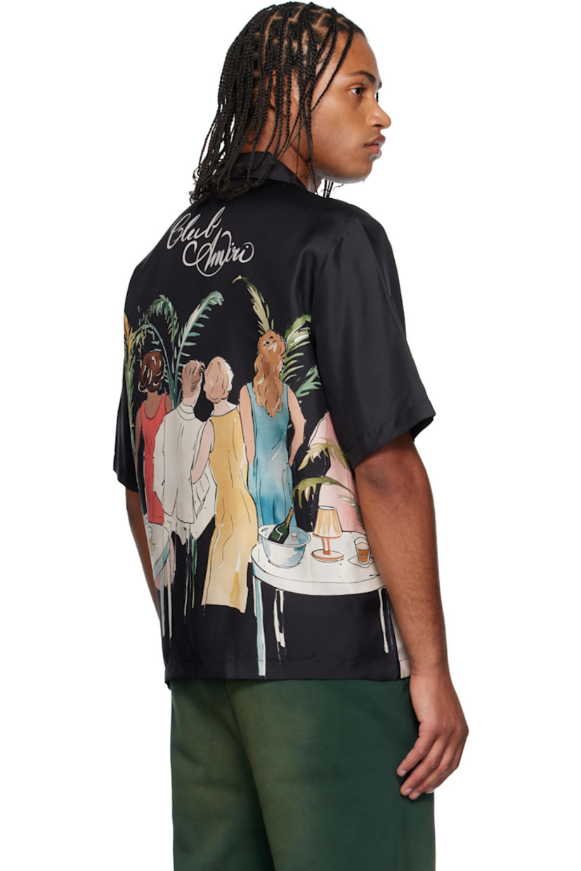 Silk twill shirt. 

· Open spread collar 
· Button closure 
· Logo printed at chest and back
· Graphics printed at front and back

Supplier color: Black