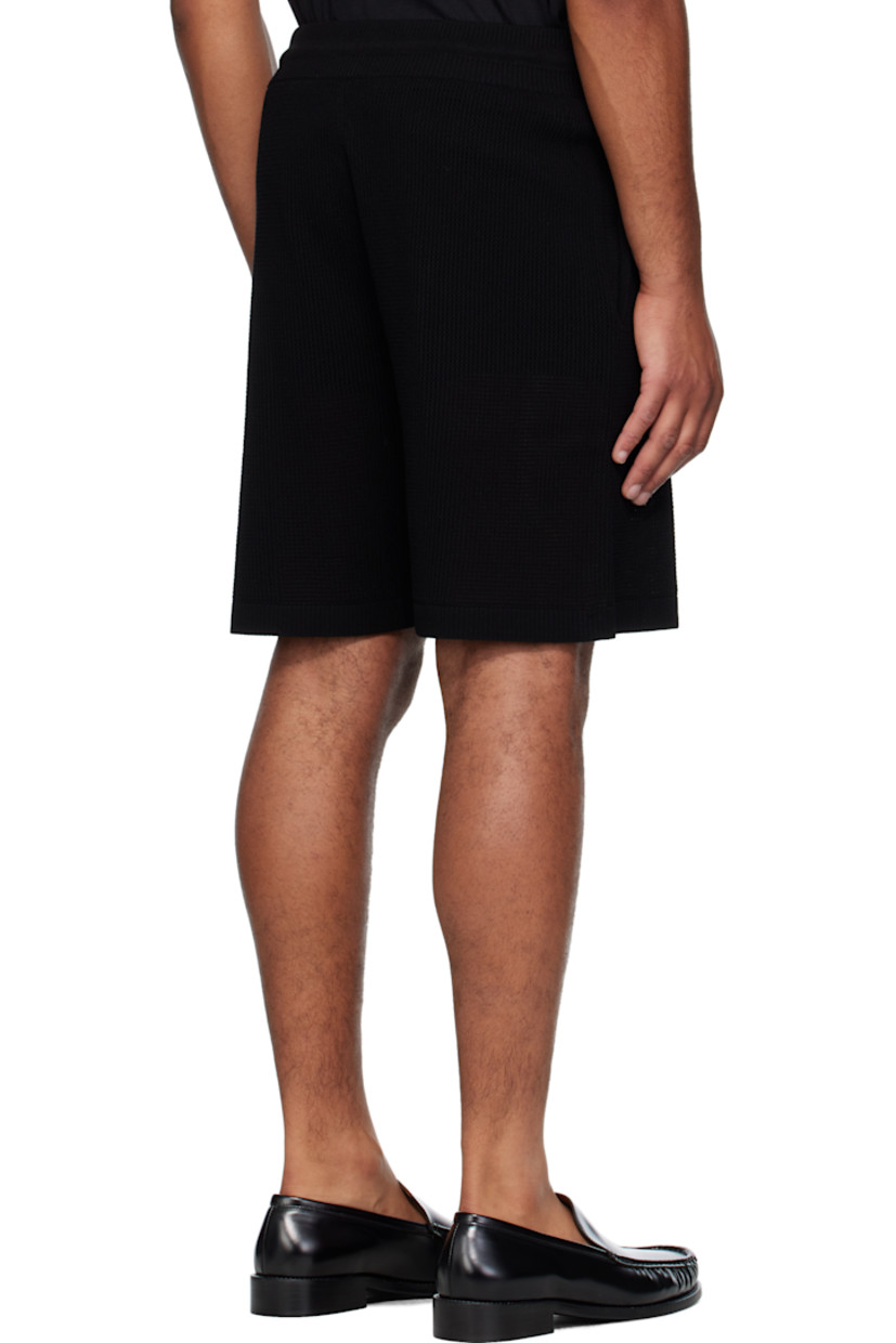 Crocheted viscose-blend shorts.

· Drawstring at elasticized waistband
· Two-pocket styling
· Logo and graphic embroidered at front leg

Supplier color: Black