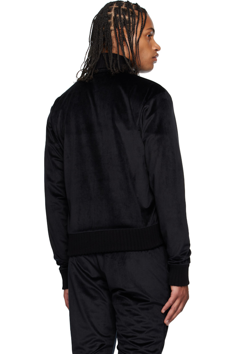 Velvet jacket. 

· Rib-knit stand collar, hem, and cuffs
· Two-way zip closure
· Embroidered logo patch and piping at chest
· Welt pockets at waist

Supplier color: Black