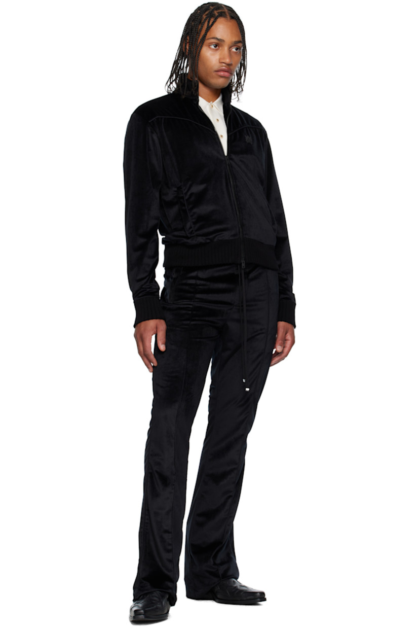 Velvet jacket. 

· Rib-knit stand collar, hem, and cuffs
· Two-way zip closure
· Embroidered logo patch and piping at chest
· Welt pockets at waist

Supplier color: Black