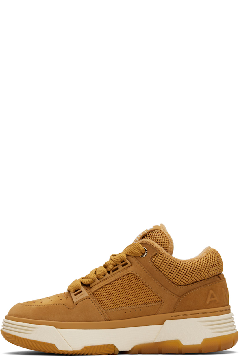 Low-top mesh and nubuck sneakers.

· Perforations at toe
· Lace-up closure
· Logo patch at padded tongue
· Padded collar
· Logo appliqué at outer side
· Logo embossed at heel counter and midsole
· Terrycloth lining
· Treaded rubber sole

Supplier color: Wheat