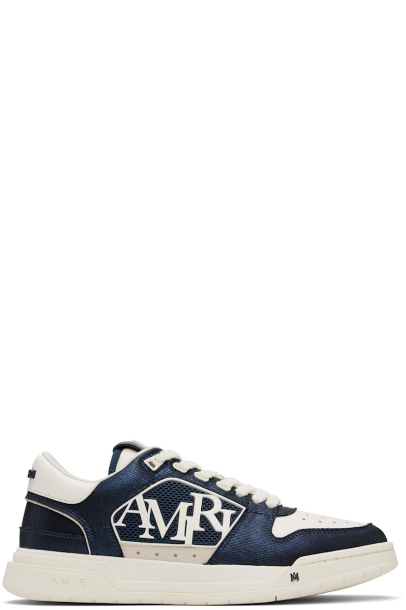 Low-top twill and buffed leather sneakers.

· Perforations at toe and sides
· Lace-up closure
· Logo patch at padded tongue
· Padded collar
· Logo appliqué at sides
· Logo embossed at heel counter and midsole
· Mesh lining
· Treaded rubber sole

Supplier color: Wet shimmer