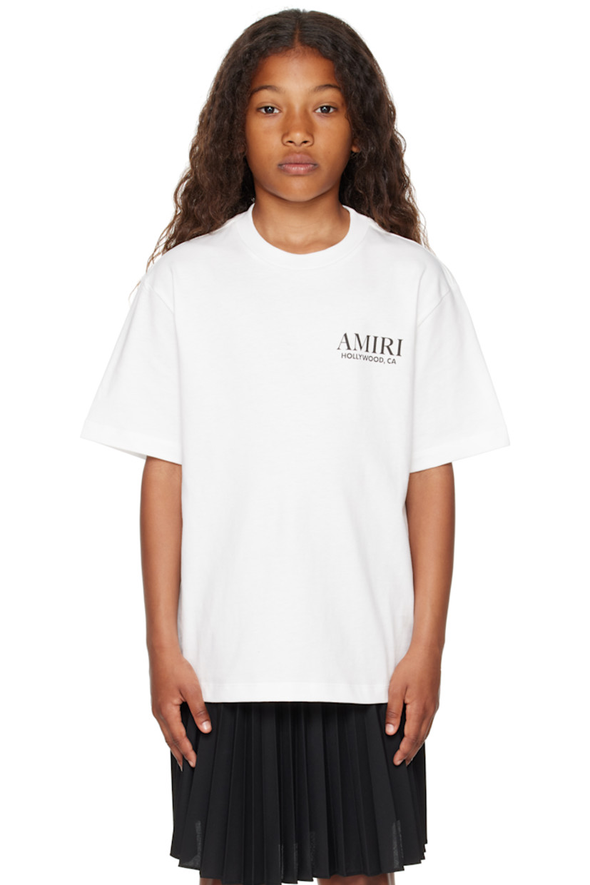 Cotton jersey T-shirt. 

· Rib-knit crewneck
· Logo and text printed at chest
· Graphic, logo, and text printed at back 
· Machine-wash

Supplier color: Ivory 

Model measures 51.97" / 132 cm tall and wears size 8Y.

Size: child's height
4Y: 41.25" / 105 cm 
6Y: 46.75" / 118.5 cm 
8Y: 52.25" / 132.5 cm 
10Y: 55.25" / 140.5 cm 
12Y: 58.5" / 148.5 cm