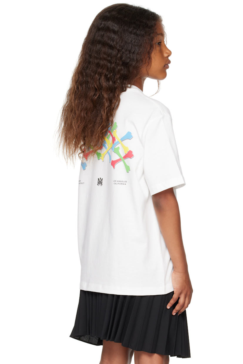 Cotton jersey T-shirt. 

· Rib-knit crewneck
· Logo and text printed at chest
· Graphic, logo, and text printed at back 
· Machine-wash

Supplier color: Ivory 

Model measures 51.97" / 132 cm tall and wears size 8Y.

Size: child's height
4Y: 41.25" / 105 cm 
6Y: 46.75" / 118.5 cm 
8Y: 52.25" / 132.5 cm 
10Y: 55.25" / 140.5 cm 
12Y: 58.5" / 148.5 cm