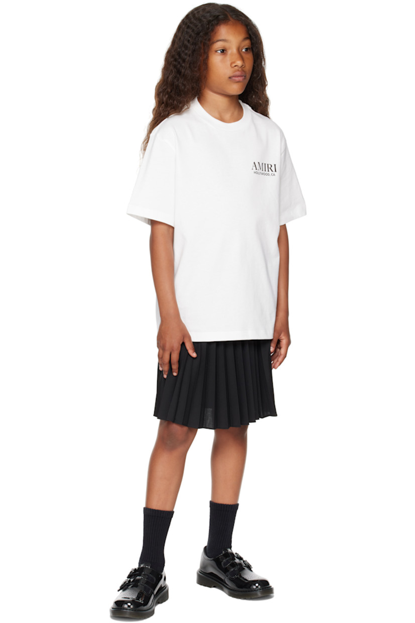 Cotton jersey T-shirt. 

· Rib-knit crewneck
· Logo and text printed at chest
· Graphic, logo, and text printed at back 
· Machine-wash

Supplier color: Ivory 

Model measures 51.97" / 132 cm tall and wears size 8Y.

Size: child's height
4Y: 41.25" / 105 cm 
6Y: 46.75" / 118.5 cm 
8Y: 52.25" / 132.5 cm 
10Y: 55.25" / 140.5 cm 
12Y: 58.5" / 148.5 cm