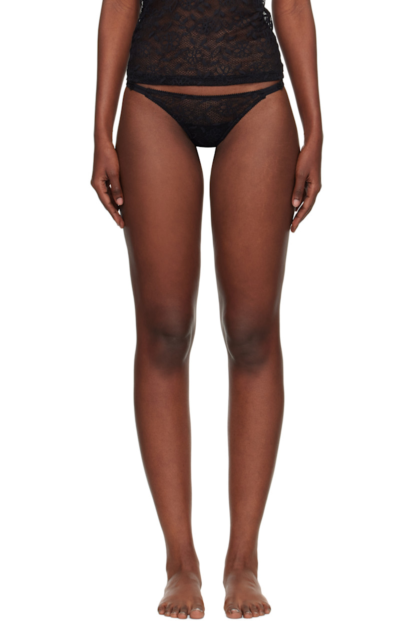Semi-sheer stretch nylon-blend lace thong.

· Picot trim and floral pattern throughout
· Straps and foral appliqué at sides
· Partial jersey lining

Supplier color: Black