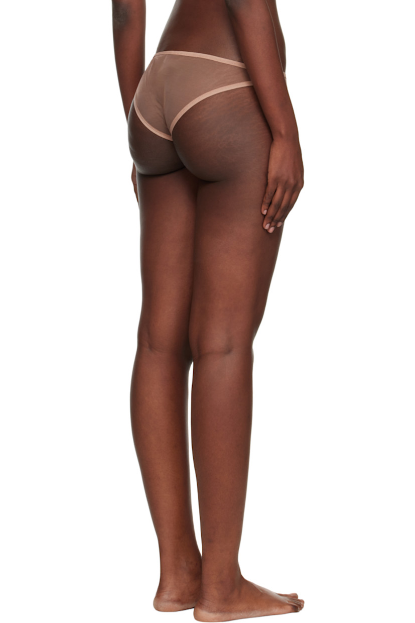 Sheer stretch nylon-blend tulle briefs.

· Low-rise
· Elasticized waistband
· Partial jersey lining 

Supplier color: Beige