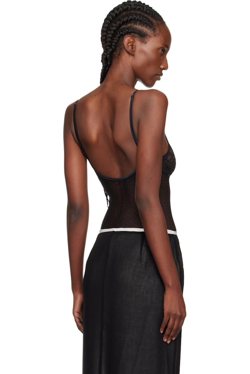 Semi-sheer stretch nylon-blend lace bodysuit.

· Floral pattern throughout
· Satin trim at scoop neck
· Picot trim at leg openings
· Adjustable elasticized spaghetti straps
· Low back

Supplier color: Black