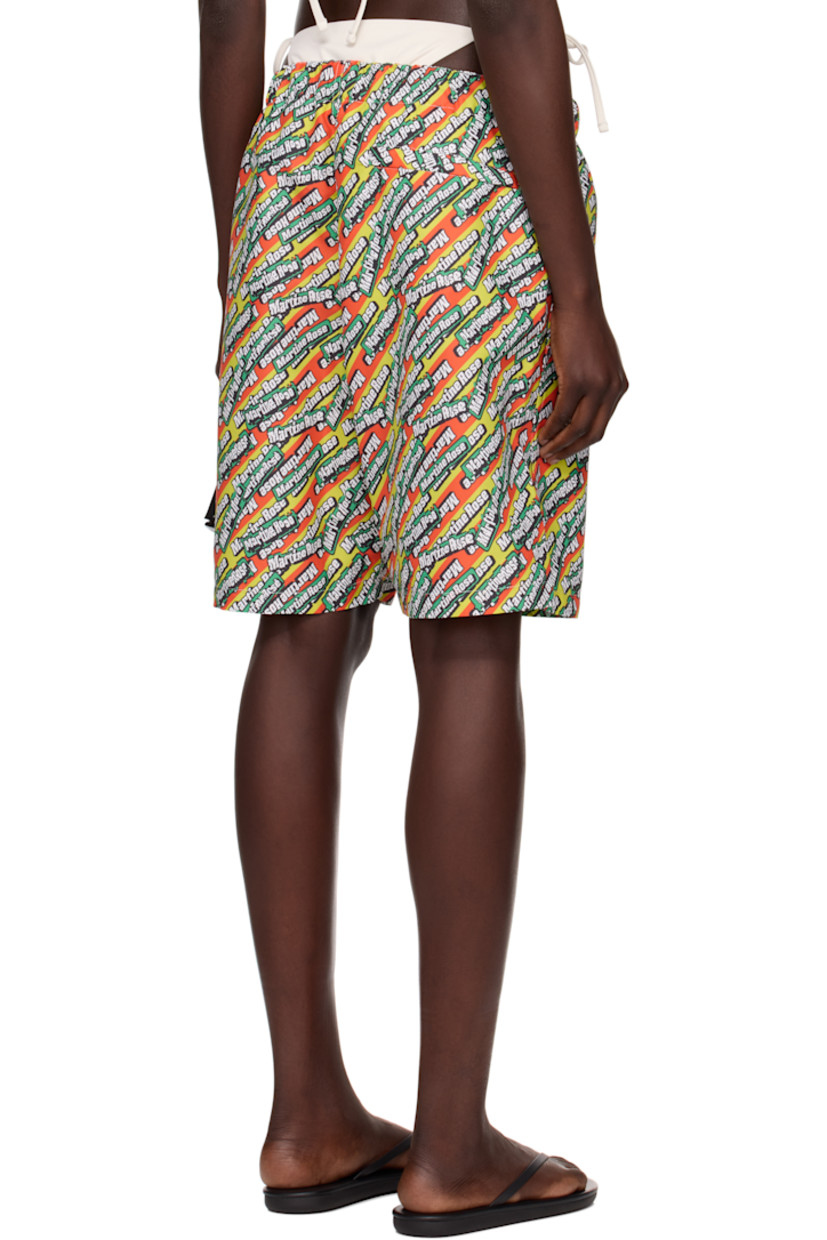 Polyester taffeta swim shorts. Logo pattern printed throughout. 

· Integrated press-release belt at elasticized waistband
· Three-pocket styling
· Mesh pocket lining

Part of the exclusive SSENSE HEAT capsule.

Supplier color: Green/Orange