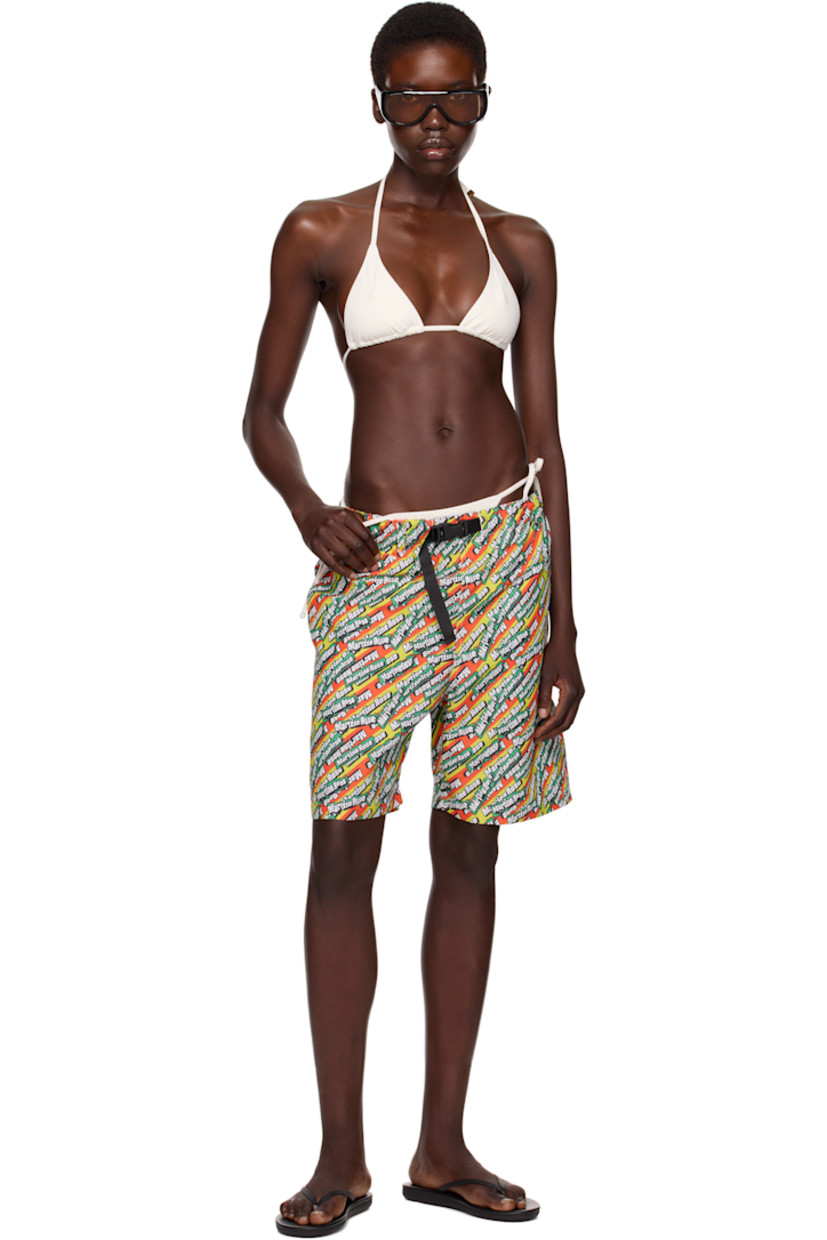 Polyester taffeta swim shorts. Logo pattern printed throughout. 

· Integrated press-release belt at elasticized waistband
· Three-pocket styling
· Mesh pocket lining

Part of the exclusive SSENSE HEAT capsule.

Supplier color: Green/Orange