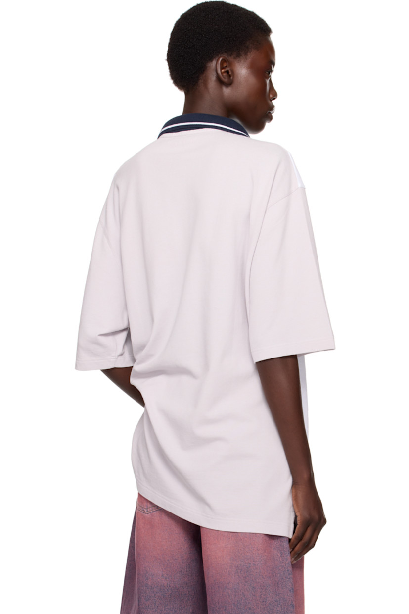 Cotton piqué polo. Stripes throughout. 

· Paneled construction 
· Striped rib-knit spread collar 
· Two-button placket 
· Logo graphic embroidered at chest
· Piping and printed logo at front 
· Vented side seams 
· Dropped shoulders

Part of the exclusive SSENSE HEAT capsule.

Supplier color: Grey navy