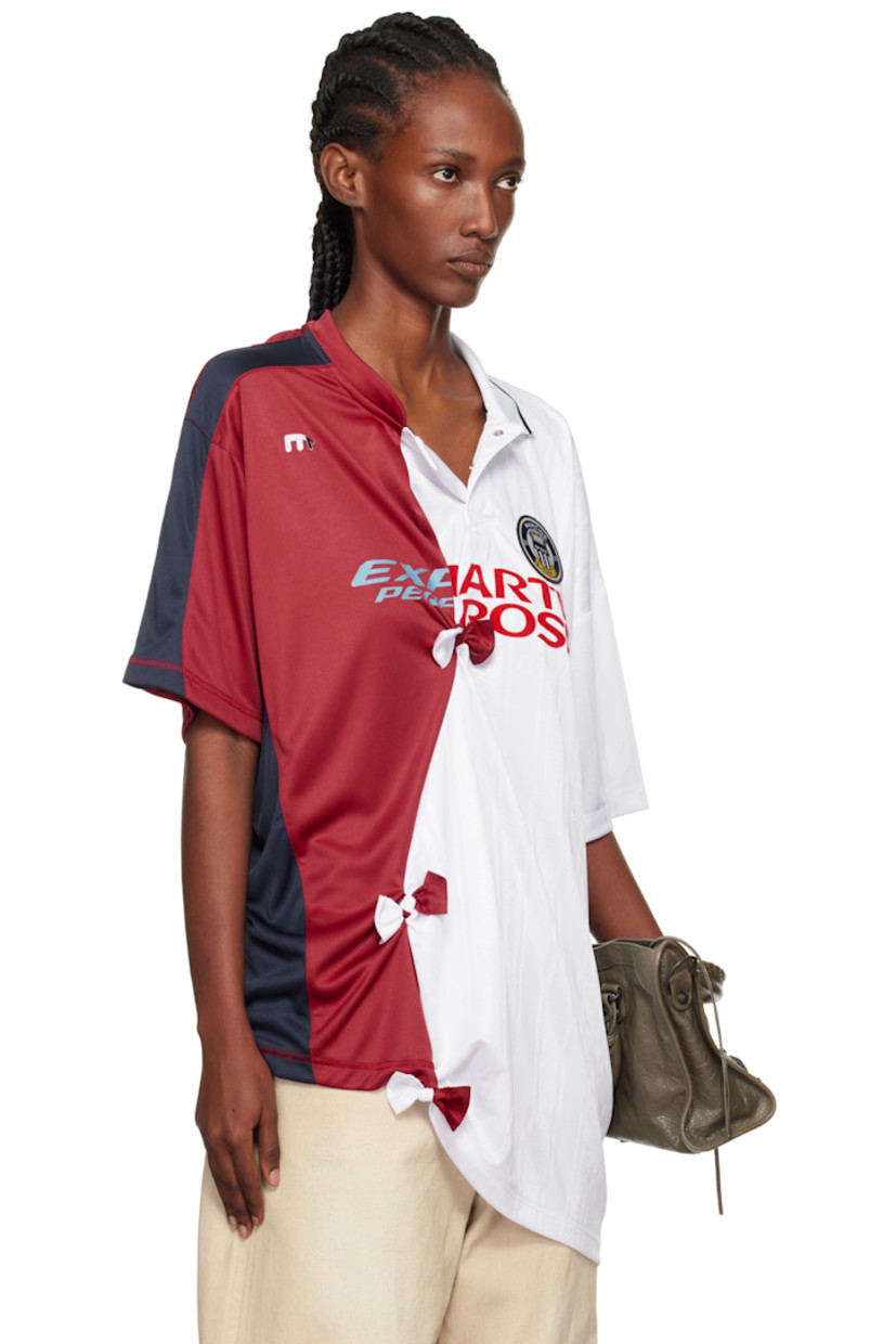 Mesh top.

· Paneled construction
· Asymmetrical collar and hem
· Press-stud placket
· Logo patch and flocked logo at chest
· Gathering and bow accents at front and back
· Logo printed at back

Supplier color: White/Burgundy