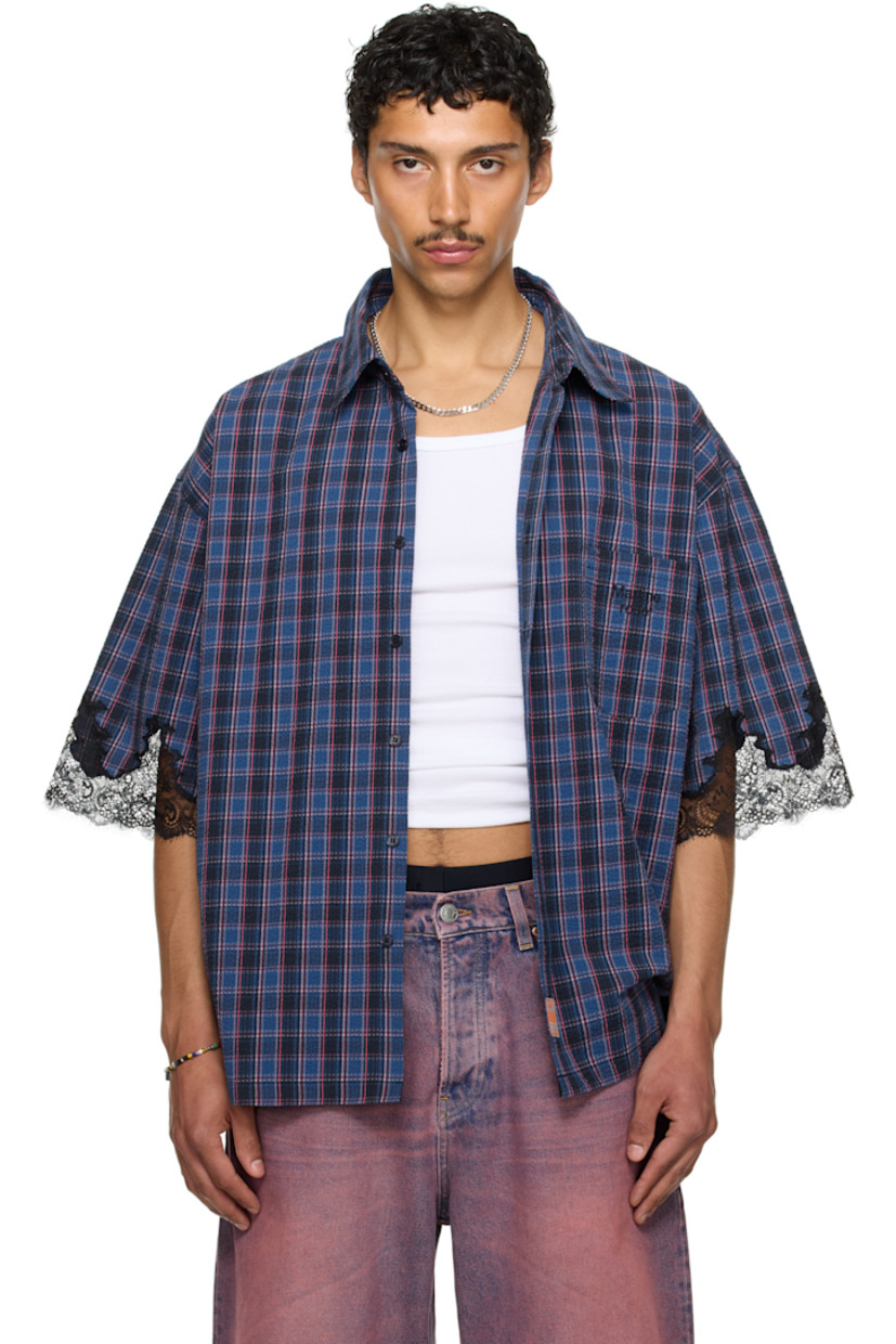 Cotton seersucker overshirt. Check pattern throughout.

· Spread collar
· Button closure
· Logo-embroidered patch pocket
· Reflective logo patch at front
· Dropped shoulders
· Scalloped lace trim at cuffs
· Box pleat at back yoke

Part of the exclusive SSENSE HEAT capsule.

Supplier color: Blue navy check