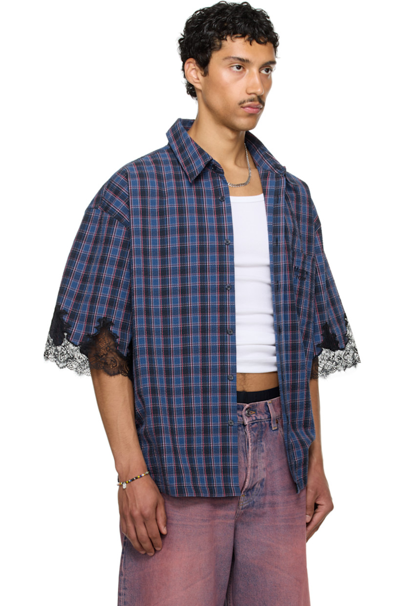 Cotton seersucker overshirt. Check pattern throughout.

· Spread collar
· Button closure
· Logo-embroidered patch pocket
· Reflective logo patch at front
· Dropped shoulders
· Scalloped lace trim at cuffs
· Box pleat at back yoke

Part of the exclusive SSENSE HEAT capsule.

Supplier color: Blue navy check