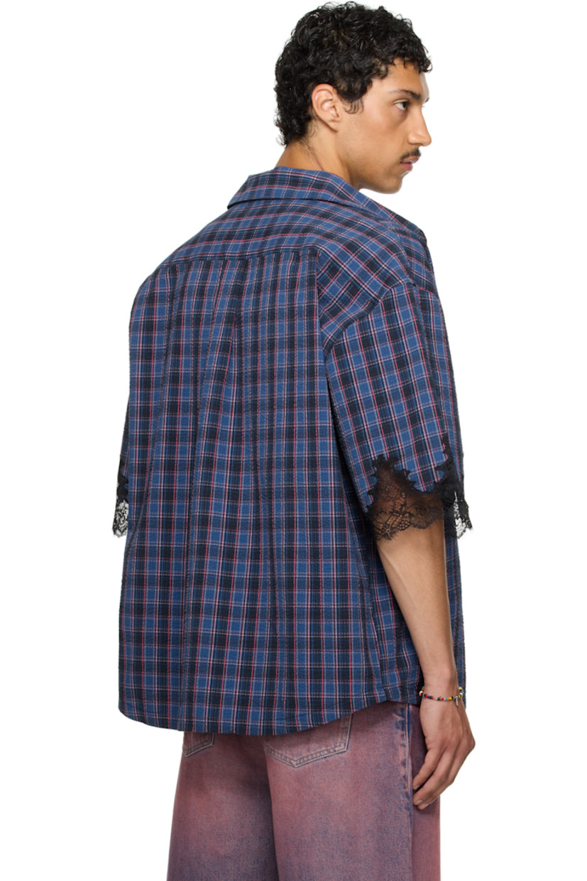 Cotton seersucker overshirt. Check pattern throughout.

· Spread collar
· Button closure
· Logo-embroidered patch pocket
· Reflective logo patch at front
· Dropped shoulders
· Scalloped lace trim at cuffs
· Box pleat at back yoke

Part of the exclusive SSENSE HEAT capsule.

Supplier color: Blue navy check