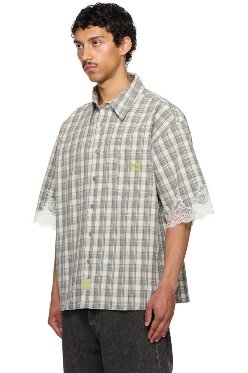 Cotton seersucker overshirt. Check pattern throughout.

· Spread collar
· Button closure
· Logo-embroidered patch pocket
· Reflective logo patch at front
· Dropped shoulders
· Scalloped lace trim at cuffs
· Box pleat at back yoke

Part of the exclusive SSENSE HEAT capsule.

Supplier color: Grey lime check