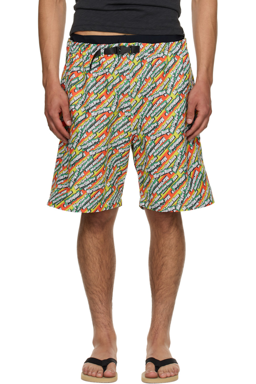 Polyester taffeta swim shorts. Logo graphic pattern printed throughout.

· Integrated press-release belt at elasticized waistband
· Three-pocket styling
· Unlined

Part of the exclusive SSENSE HEAT capsule. 

Supplier color: Green/Orange