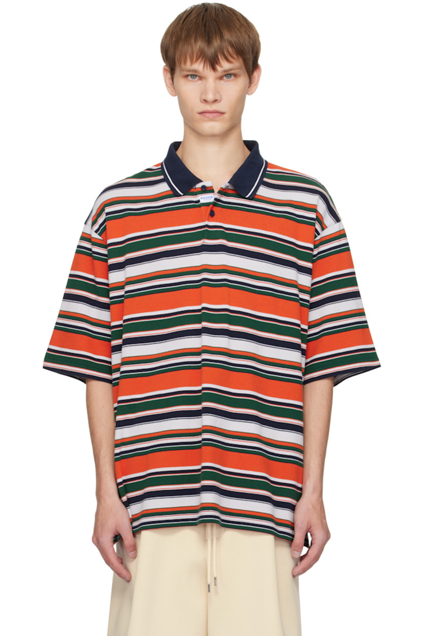 Cotton piqué polo.

· Stripe pattern throughout
· Stripe at spread collar
· Logo patch at two-button placket
· Vented side seams
· Dropped shoulders
· Logo embroidered at back

Supplier color: Green/Orange