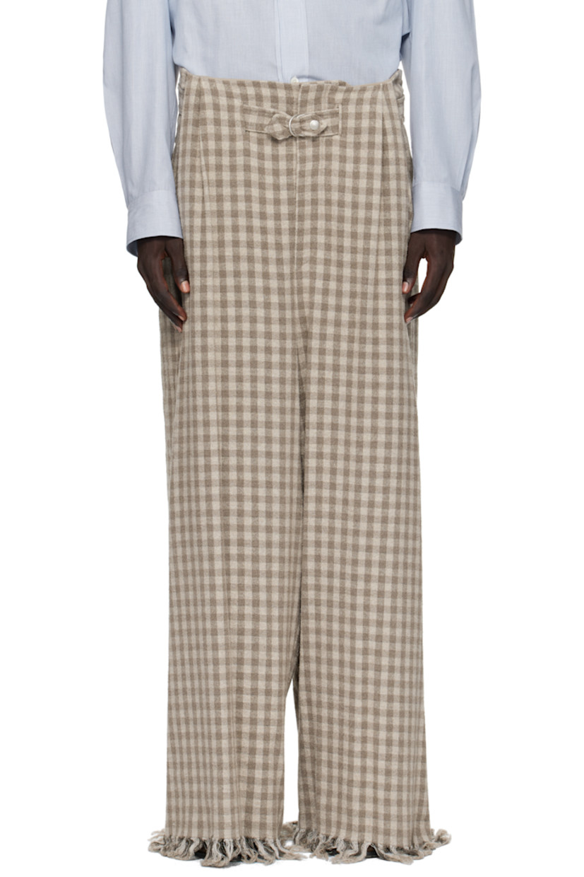 Stretch cotton- and wool-blend bouclé trousers.

· Jacquard check pattern throughout 
· Belt loops
· Detachable cinch belt 
· Four-pocket styling
· Zip fly 
· Pleats at front 
· Frayed edges at cuffs

Supplier color: Medium beige