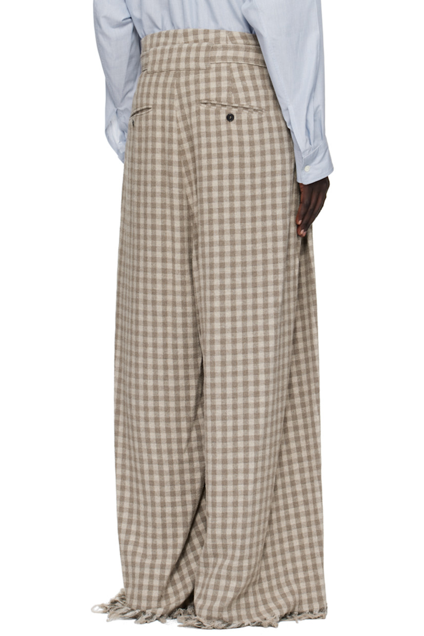 Stretch cotton- and wool-blend bouclé trousers.

· Jacquard check pattern throughout 
· Belt loops
· Detachable cinch belt 
· Four-pocket styling
· Zip fly 
· Pleats at front 
· Frayed edges at cuffs

Supplier color: Medium beige