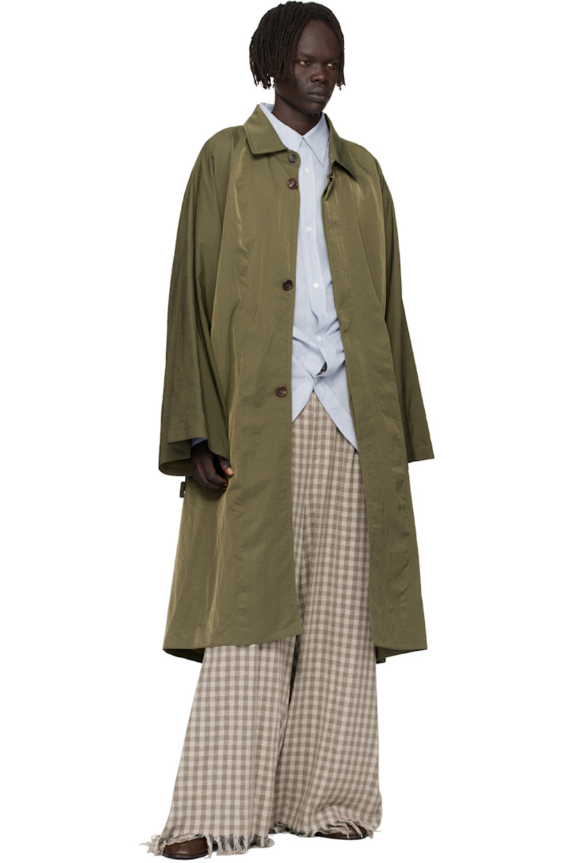 Stretch cotton- and wool-blend bouclé trousers.

· Jacquard check pattern throughout 
· Belt loops
· Detachable cinch belt 
· Four-pocket styling
· Zip fly 
· Pleats at front 
· Frayed edges at cuffs

Supplier color: Medium beige