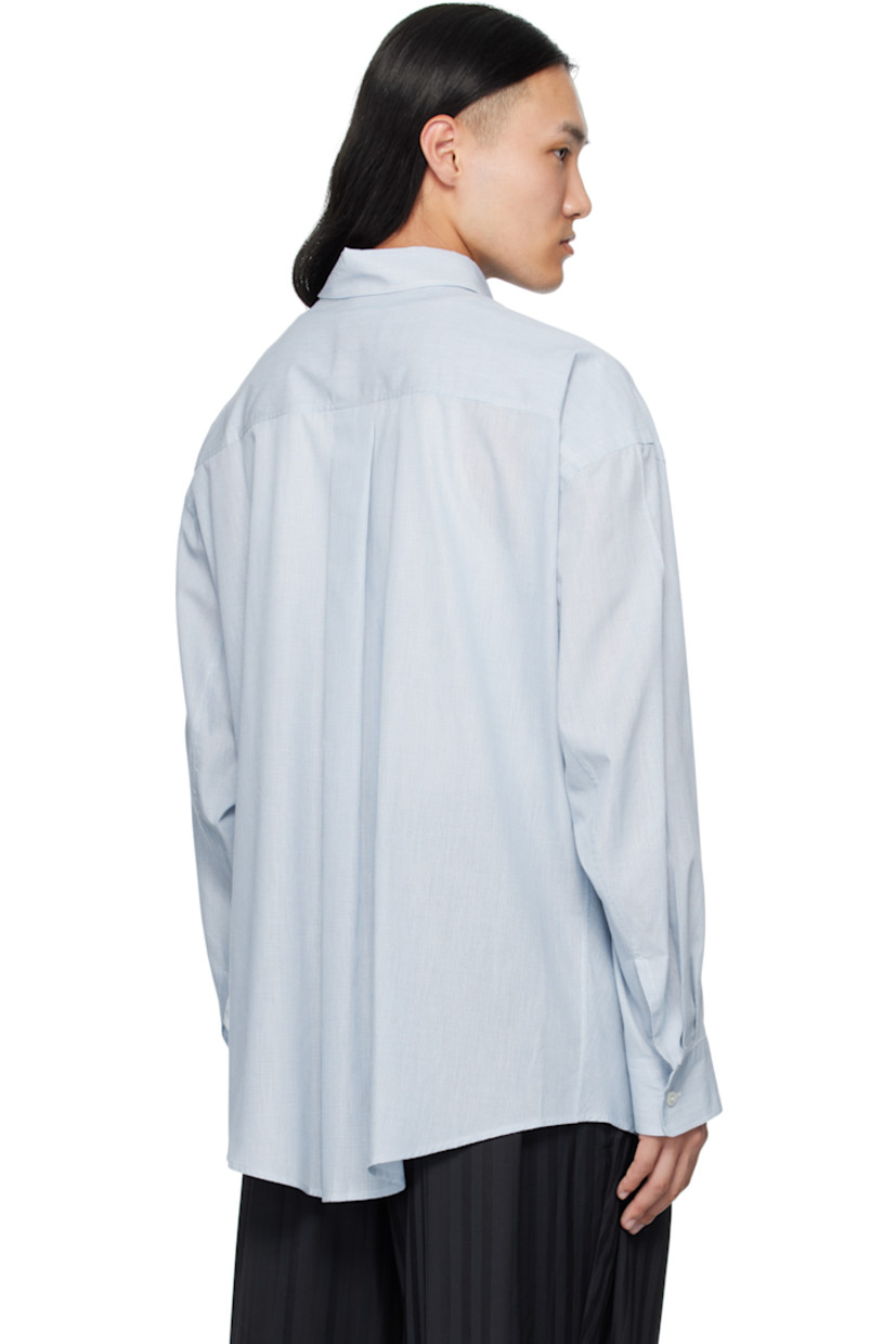 Lightweight cotton poplin shirt.

· Semi-sheer
· Button closure
· Modified hem
· Dropped shoulders and armscyes
· Buttoned barrel cuffs

Supplier color: Light/Pastel blue