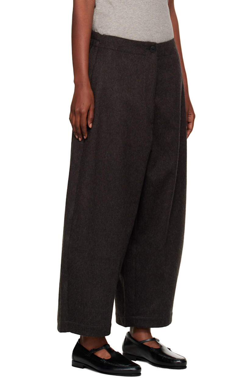 Felted wool-blend trousers.

· Partially elasticized waistband
· Two-pocket styling
· Zip fly
· Curved outseams

Supplier color: Java