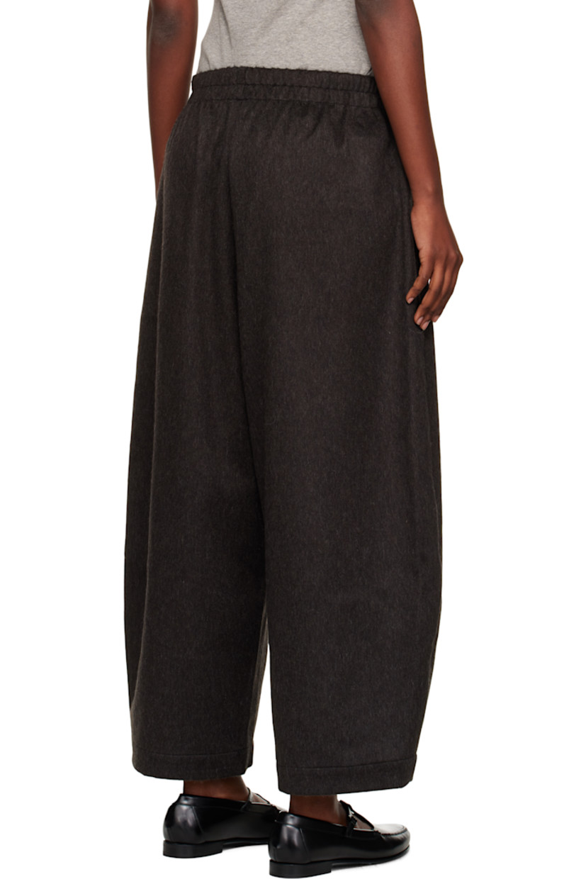 Felted wool-blend trousers.

· Partially elasticized waistband
· Two-pocket styling
· Zip fly
· Curved outseams

Supplier color: Java