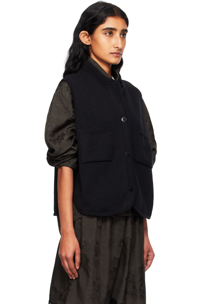 Knit ECOTEC® upcycled cotton-blend cardigan.

· Rib-knit stand collar
· Button closure
· Patch pockets at front
· Logo-engraved hardware

Supplier color: Black