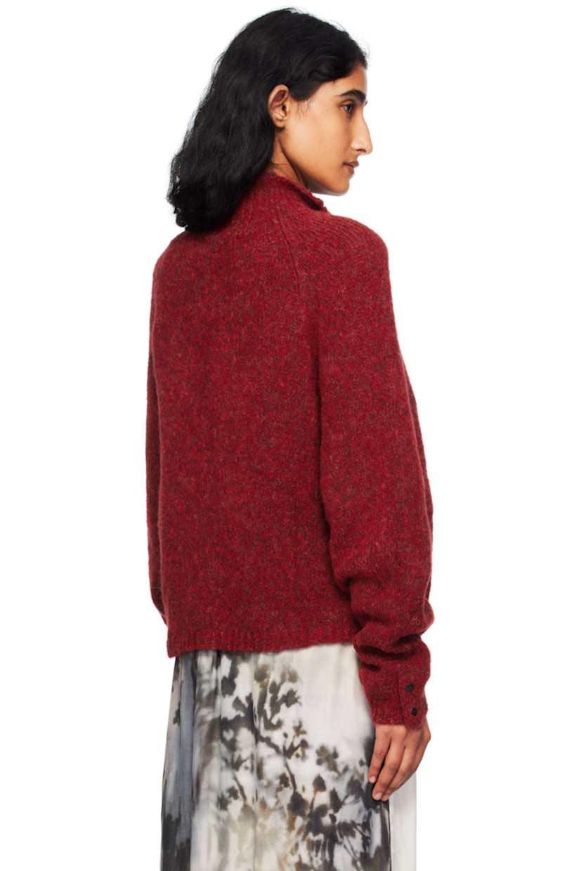 Brushed knit baby alpaca-blend sweater.

· Rib-knit mock neck, hem, and cuffs
· Six-button placket
· Raglan sleeves
· Button vent at cuffs
· Logo-engraved hardware

Supplier color: Dahlia