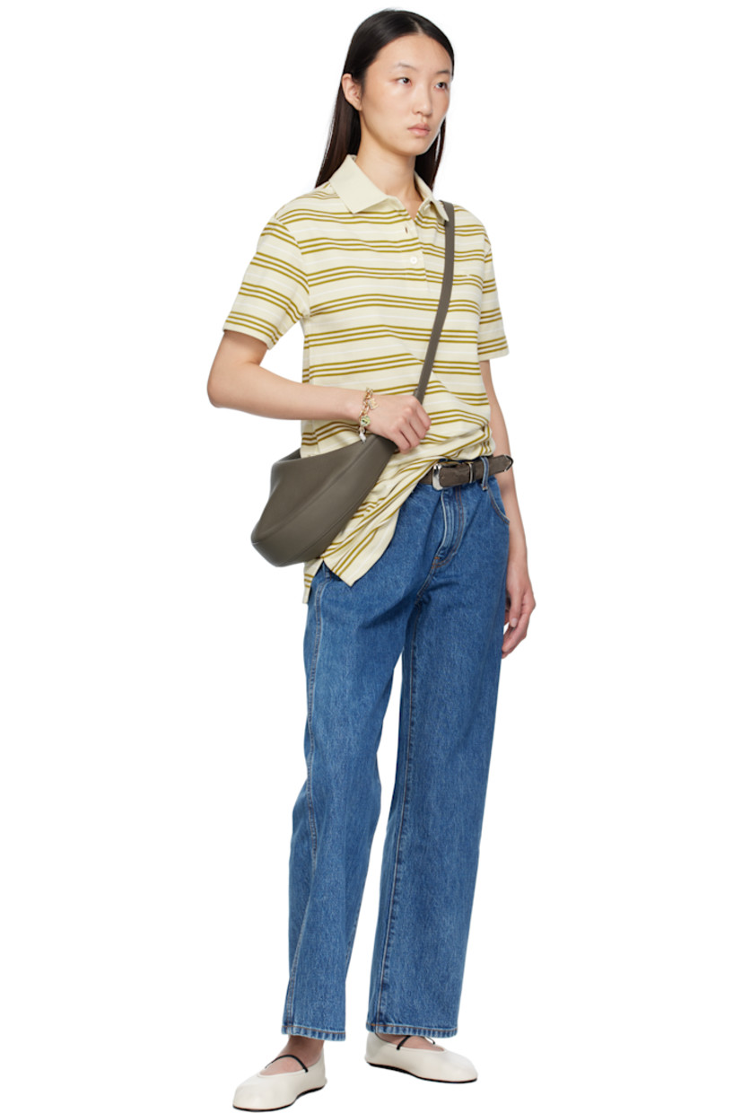 Pebble-grained calfskin shoulder bag.

· Adjustable crossbody strap
· Logo stamp at face
· Zip closure
· Suede interior
· Unlined
· H7" x W15" x D2.75"

Supplier color: Elephant