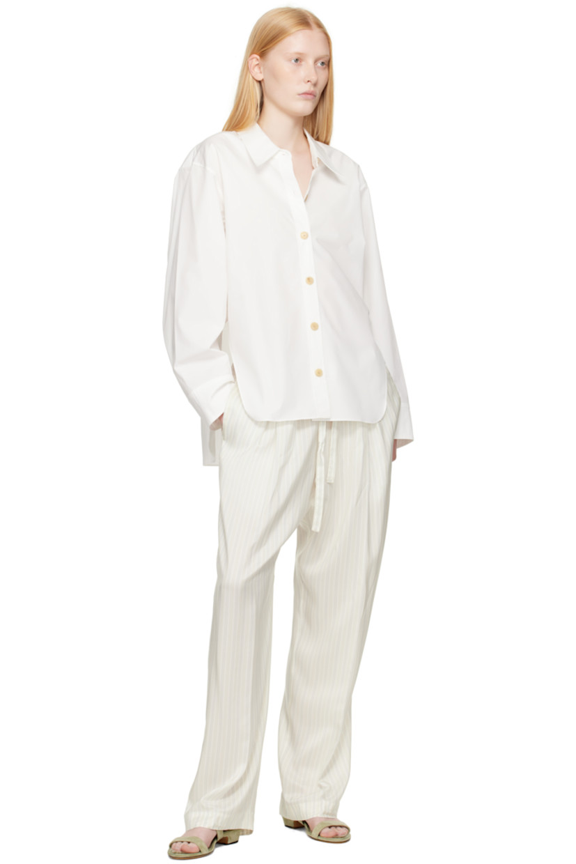 Loose-fit silk-blend poplin trousers. Stripes throughout.

· Drawstring at elasticized waistband 
· Two-pocket styling
· Pleats at front 

Supplier color: Multicolor stripe