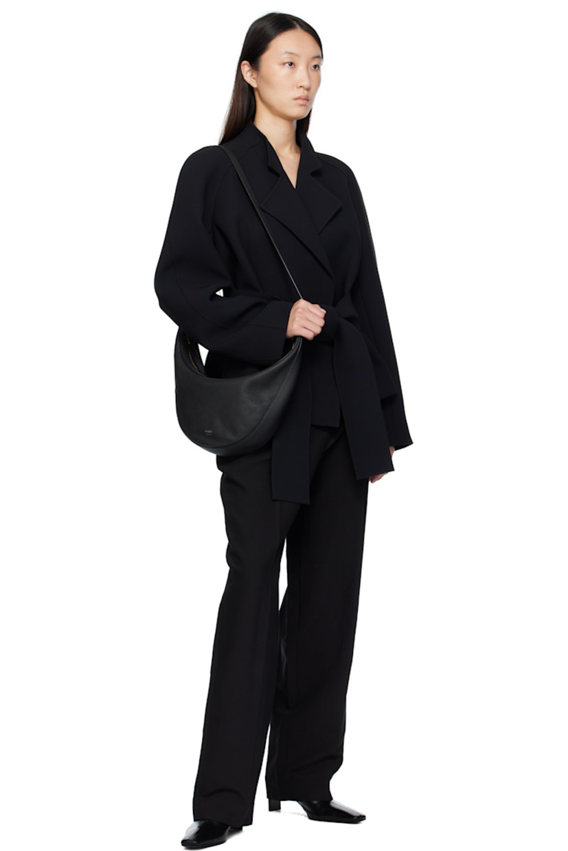 Ankle-high vegetable-tanned crinkled calfskin slip-on boots.

· Pointed square toe
· Notch at heel collar
· Buffed leather lining
· Covered block heel with rubber injection
· Leather sole
· Heel: H2"

Supplier color: Black glazed leather