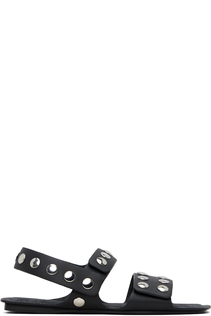 Vachetta calfskin flat sandals in black.

· Studs throughout
· Open square toe
· Press-stud straps at vamp
· Press-stud slingback strap
· Logo embossed at padded footbed
· Suede lining
· Leather sole with rubber injection

Supplier color: Black leather/Silver studs