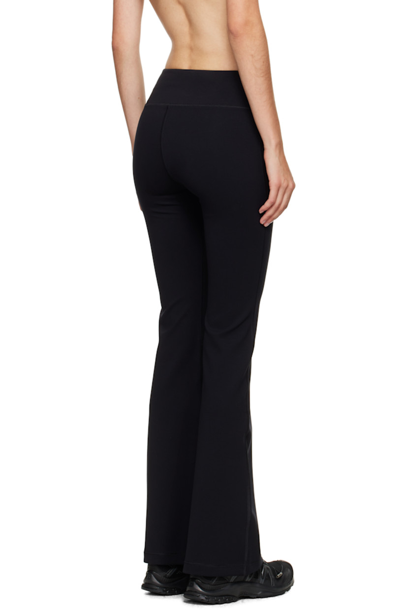 Flared 180 gsm stretch nylon jersey sport leggings.

· Flatlock seams throughout
· High-rise
· Elasticized waistband
· Logo printed at front leg

Supplier color: Black