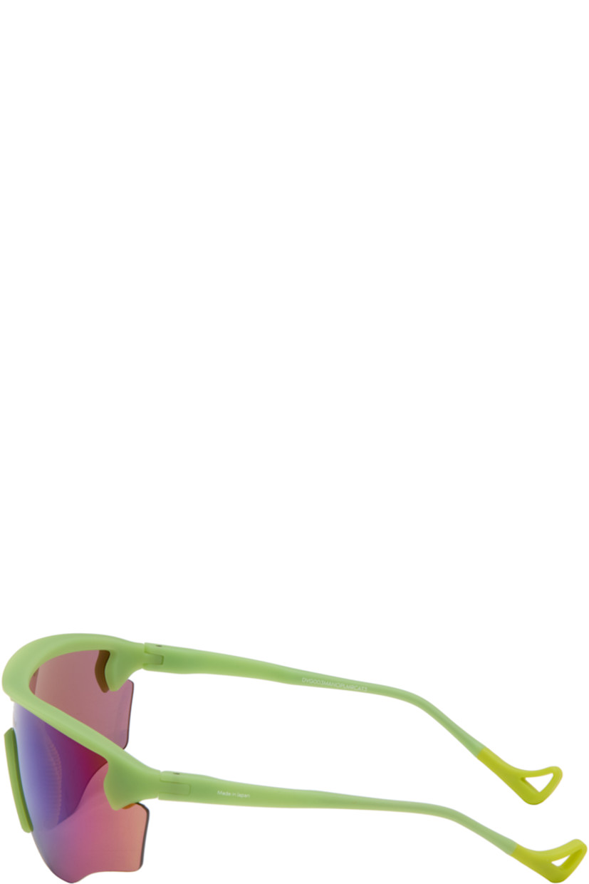 Shield-style semi-rimless acrylic-frame sunglasses.

· Mirrored iridescent lens with D+ lens technology
· 100% UVA/UVB protection
· Integrated rubber nose pads
· Logo printed at lens and temple
· Eyewear chain-compatible rubber temple tips
· Includes microfiber pouch
· Size: 140 125

Supplier color: Mantis/D+ opal mirror