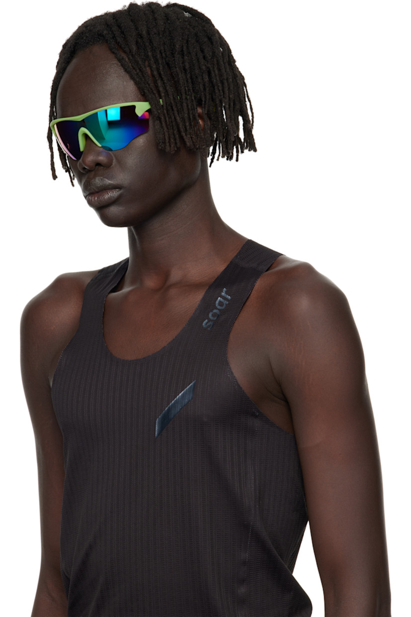 Shield-style semi-rimless acrylic-frame sunglasses.

· Mirrored iridescent lens with D+ lens technology
· 100% UVA/UVB protection
· Integrated rubber nose pads
· Logo printed at lens and temple
· Eyewear chain-compatible rubber temple tips
· Includes microfiber pouch
· Size: 140 125

Supplier color: Mantis/D+ opal mirror