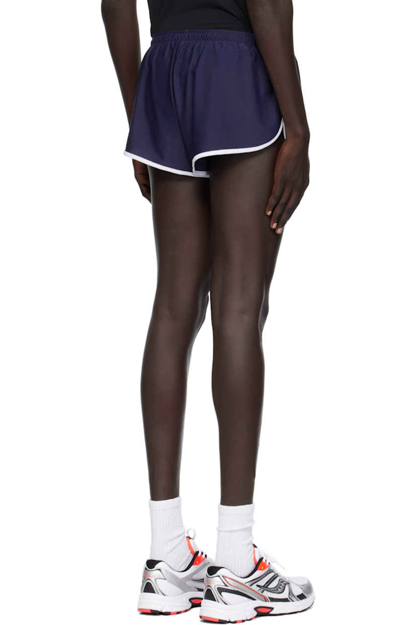 150 gsm stretch nylon mesh shorts. 

· Drawstring at elasticized waistband
· Embroidered logo at leg 
· Vented  outseams 
· Integrated stretch jersey brief-style underlay 

Supplier color: Navy