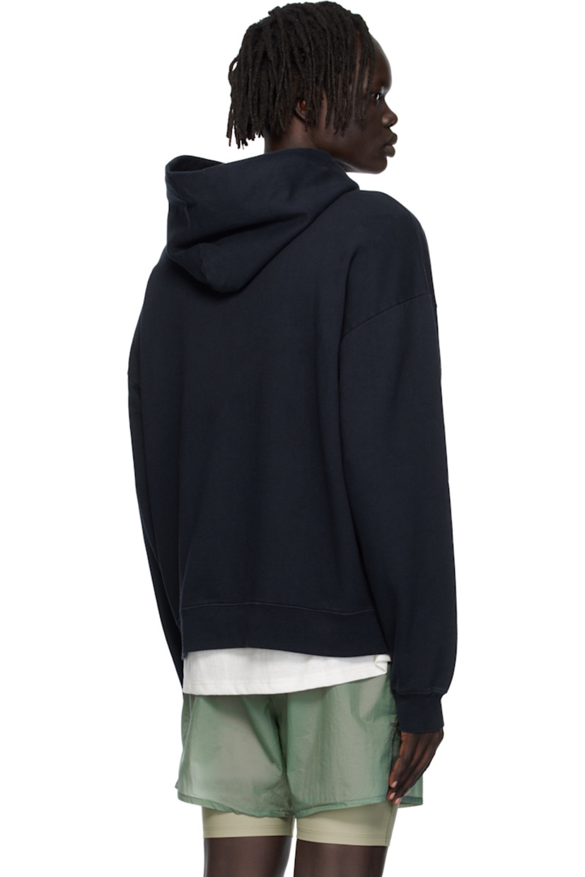 11.5 oz cotton fleece hoodie. 

· Pre-shrunk, pigment-dyed, and stonewashed
· Logo embroidered at chest
· Kangaroo pocket
· Rib-knit hem and cuffs
· Dropped shoulders

Supplier color: Chakra navy
