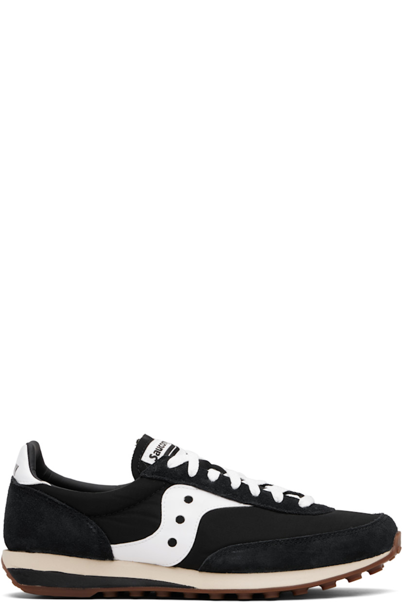 Low-top mesh and suede sneakers.

· Lace-up closure
· Logo patch at padded tongue
· Padded collar
· Buffed leather logo appliqué at sides
· Logo printed at heel tab
· Foam rubber midsole
· Treaded rubber sole

Supplier color: Black/White