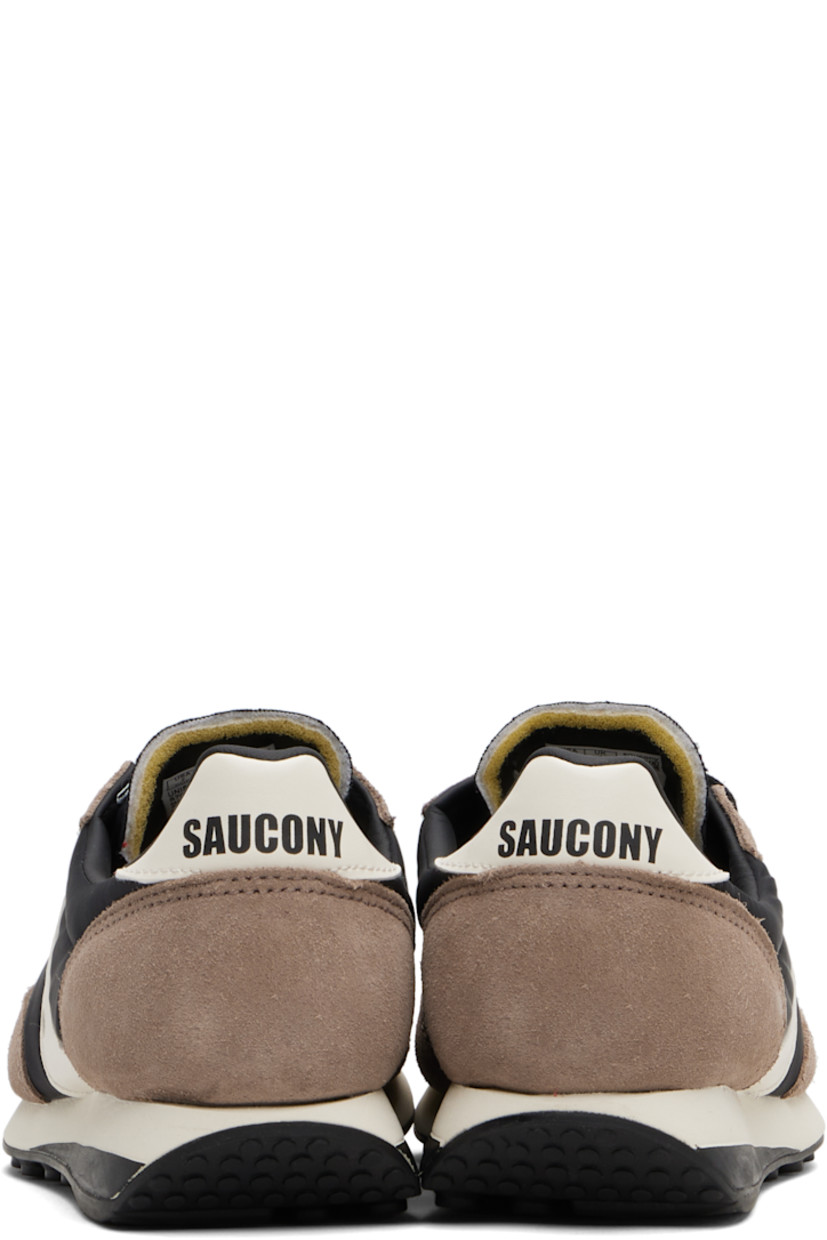 Low-top mesh and suede sneakers.

· Lace-up closure
· Logo patch at padded tongue
· Padded collar
· Buffed leather logo appliqué at sides
· Logo printed at heel tab
· Foam rubber midsole
· Treaded rubber sole

Supplier color: Black/Tan