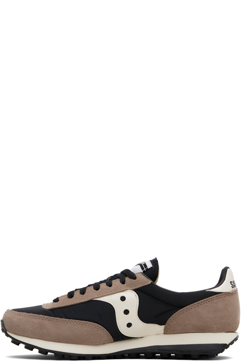 Low-top mesh and suede sneakers.

· Lace-up closure
· Logo patch at padded tongue
· Padded collar
· Buffed leather logo appliqué at sides
· Logo printed at heel tab
· Foam rubber midsole
· Treaded rubber sole

Supplier color: Black/Tan