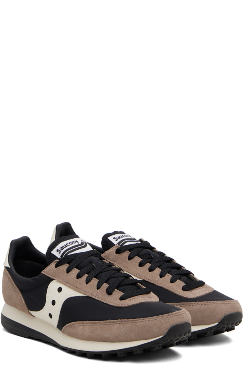 Low-top mesh and suede sneakers.

· Lace-up closure
· Logo patch at padded tongue
· Padded collar
· Buffed leather logo appliqué at sides
· Logo printed at heel tab
· Foam rubber midsole
· Treaded rubber sole

Supplier color: Black/Tan