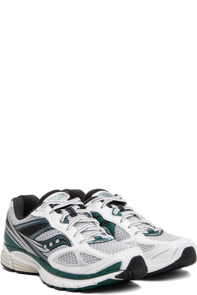 Low-top mesh sneakers.

· Bonded reflective trim throughout
· Lace-up closure
· Logo patch at padded tongue
· Padded collar
· Logo bonded at sides
· Text printed at outer side
· Logo printed at heel counter
· Textured foam rubber midsole
· Treaded ProGrid rubber sole

Supplier color: White/Pine