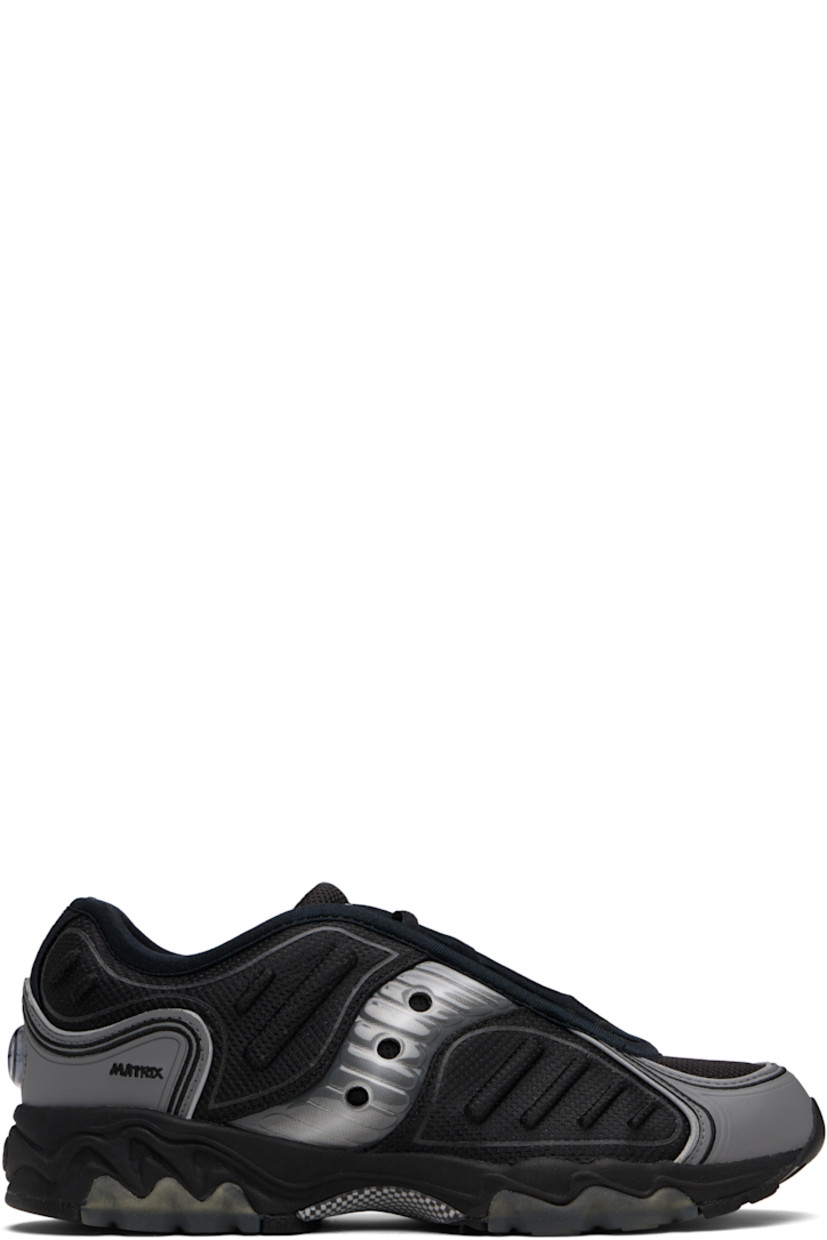 Low-top mesh and buffed faux-leather sneakers.

· Reflective trim throughout
· Lace-up closure
· Logo embroidered at padded tongue
· Padded collar
· Text embroidered at outer side and heel
· Logo appliqué at sides and heel counter
· Jersey and mesh lining
· Foam rubber midsole
· Treaded XT-900 rubber sole

Supplier color: Black/Metallic